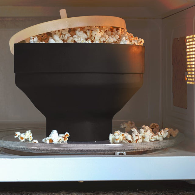 Collapsible Microwave Popcorn Maker in BPA-free silicone for easy homemade popcorn; perfect for movie nights and gatherings.