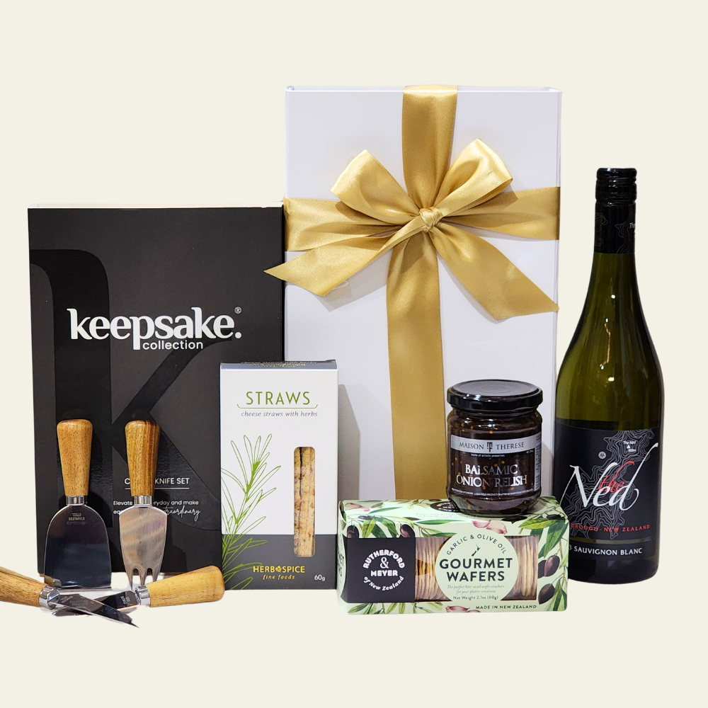 Elegant Wine & Cheese Knives Gift Box featuring wine, gourmet wafers, relish, straws, and a luxurious 4-piece knife set.