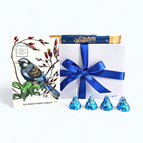 A charming gift box filled with assorted chocolates, elegantly packaged and perfect for any occasion.