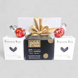 Choccy Dessert Gift Box featuring dark chocolate pudding, brownie bites, and Lindor truffles in an elegant ribboned package.