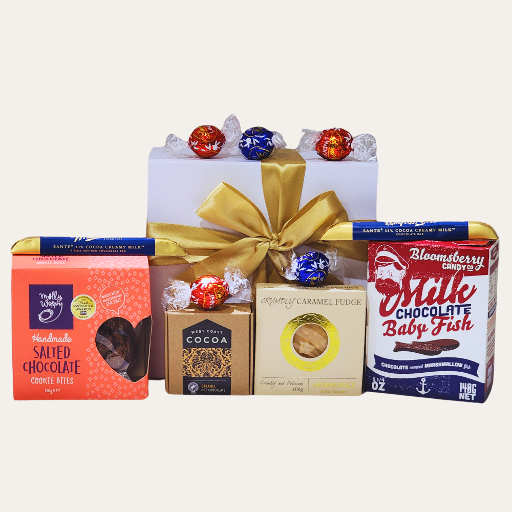 Luxurious Diwali gift box filled with chocolates, cookies, and hot chocolate for a sweet festive celebration.