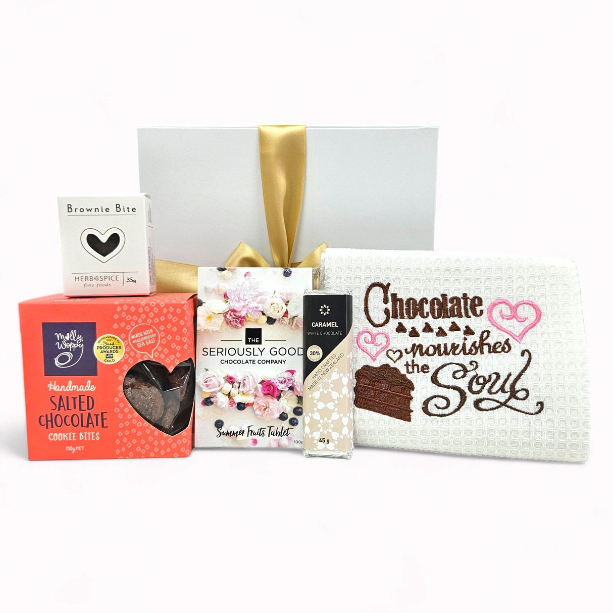 Elegant gift box filled with gourmet chocolates and a charming waffle tea towel, perfect for any chocolate lover.