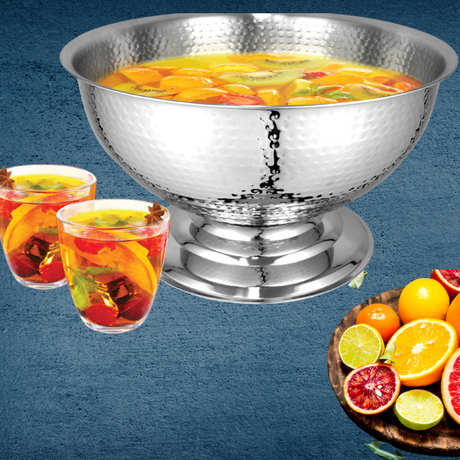 Elegant hammered stainless steel punch bowl with pedestal base, perfect for chilling champagne or serving punch at celebrations.