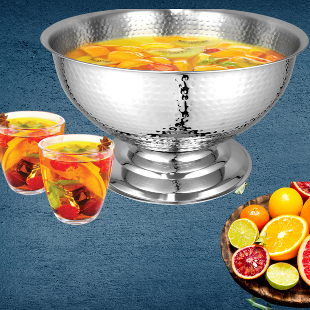 Elegant hammered stainless steel punch bowl with pedestal base, perfect for chilling champagne or serving punch at celebrations.