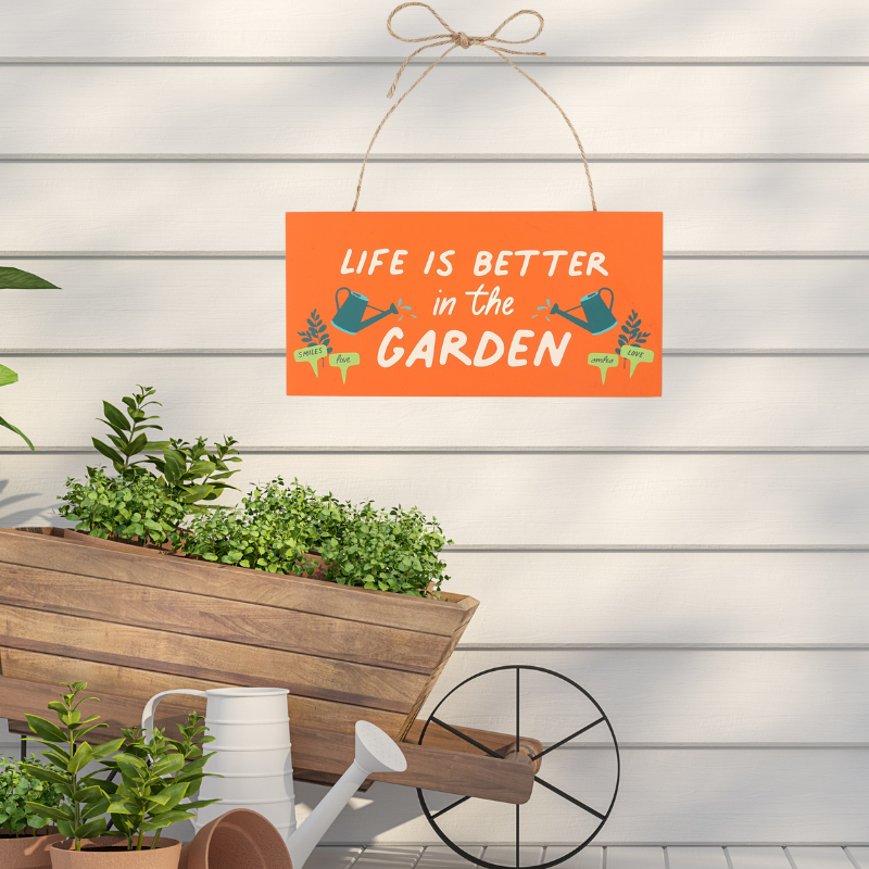 Hanging wooden garden plaque with "Life is better in the garden" message, enhancing outdoor spaces with rustic charm.