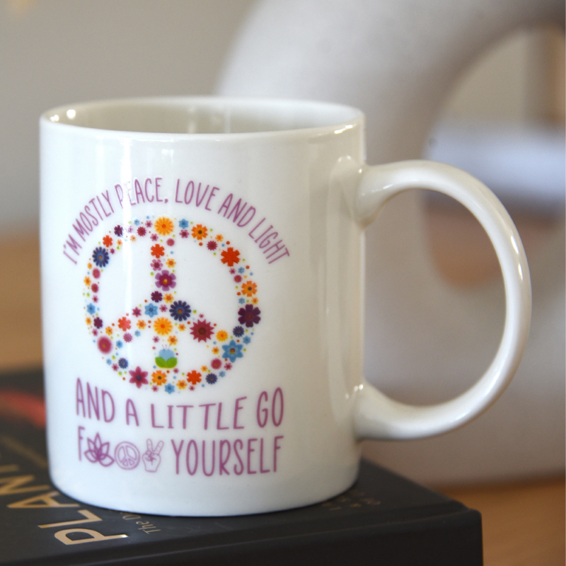 Ceramic Mostly Peace Mug with funny quotes, perfect for morning coffee, 350ml capacity, microwave and dishwasher safe.