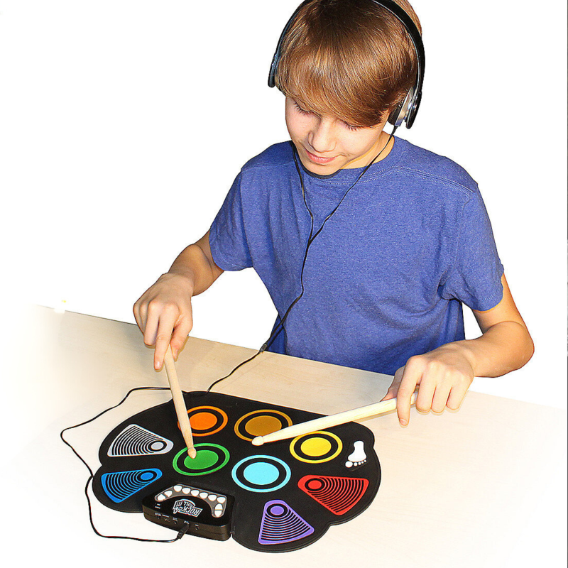 Flexible roll-up drum set with color-coded learning, includes sticks, pedals, and versatile audio options for aspiring drummers.