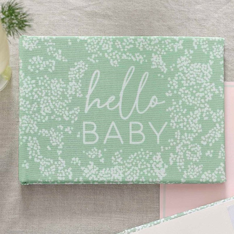 Elegant linen baby photo album with 'Hello Baby' cover, featuring photo spaces and blank pages for memories and messages.