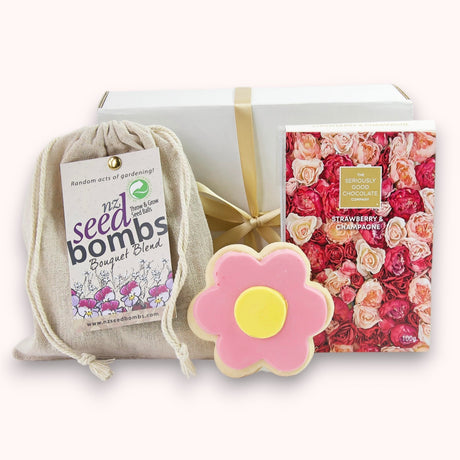 Charming Flower Power Gift Box with seed bombs, gourmet chocolate, and iced shortbread for thoughtful gifting.
