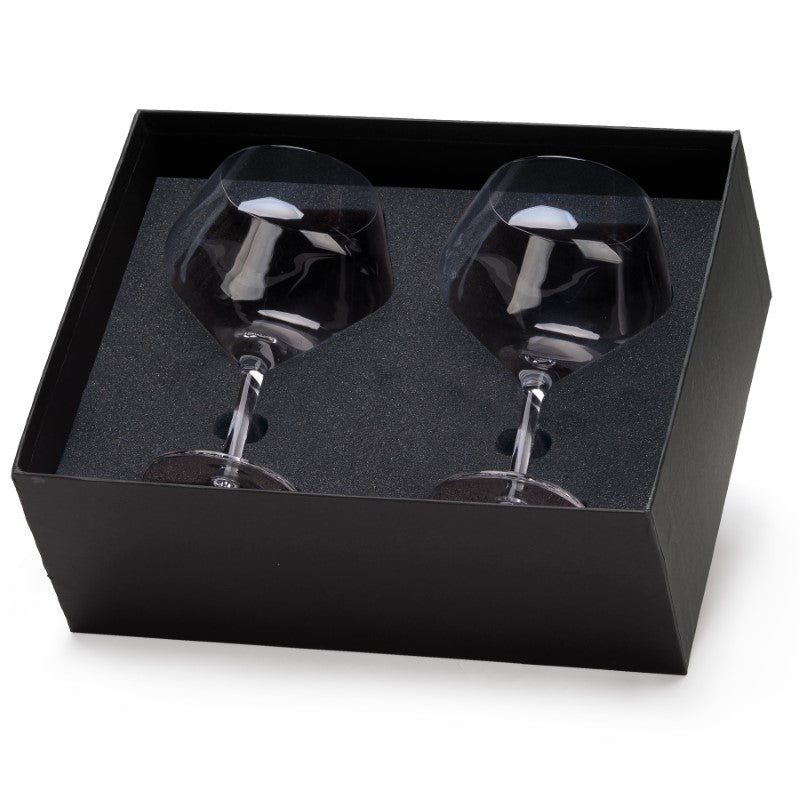 Elegant balloon-shaped gin and tonic glass, perfect for serving cocktails, presented in a sleek black gift box.