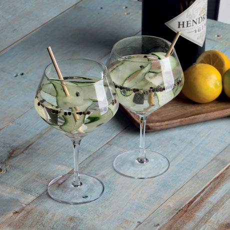 Elegant balloon-shaped gin and tonic glass, perfect for serving cocktails, presented in a sleek black box.