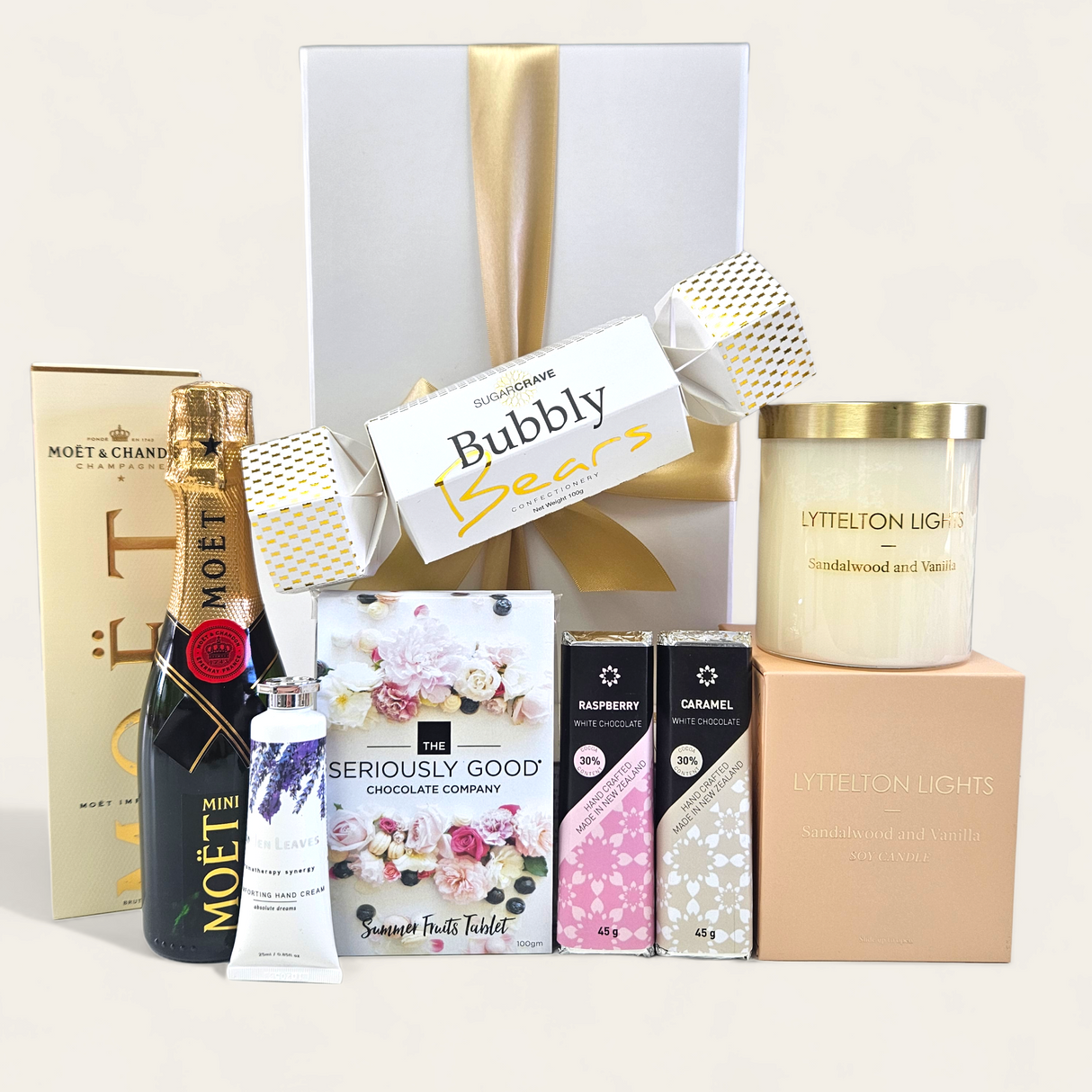 Luxurious Glamorous Gift Box featuring Moet, gourmet chocolates, a soothing candle, and premium hand cream.