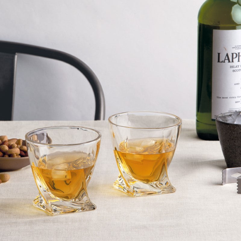 Elegant whiskey glass set with curved design, heavy bases, and a gift box for the perfect sipping experience.