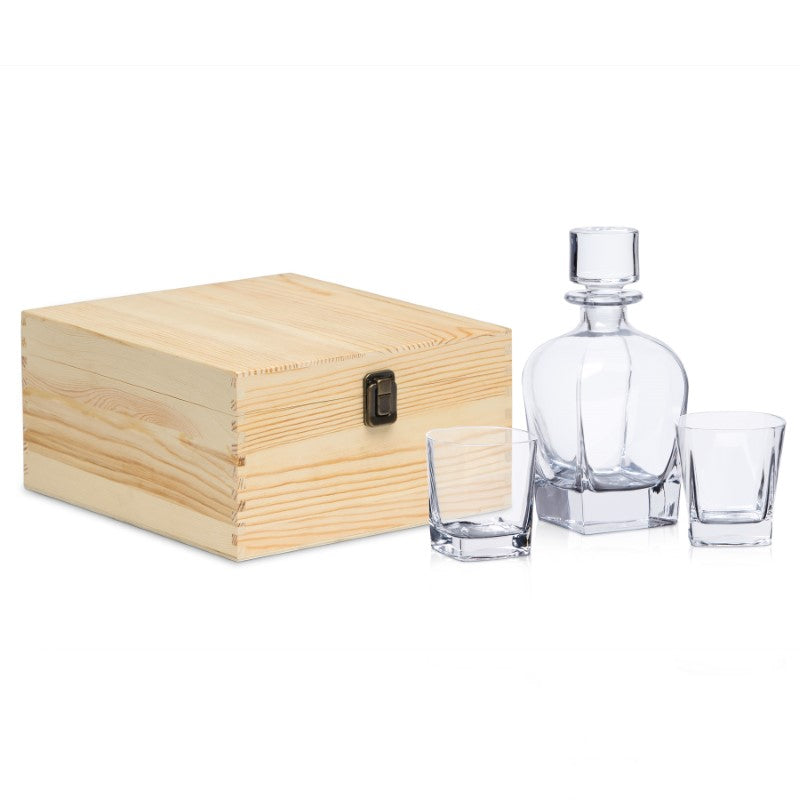 Luxurious whisky decanter set with lead-free crystal, geometric stopper, and engraved glasses in a pine presentation box.