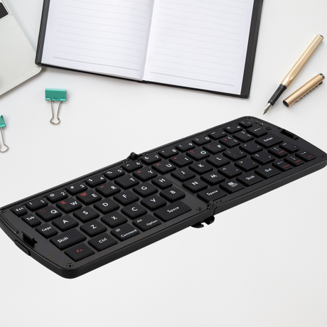 Sleek Bluetooth Folding Keyboard with a compact design, ideal for remote work and travel, offering full-size functionality.
