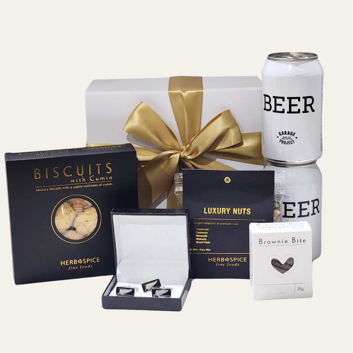 "Elegant Kiwi Fern & Brews Gift Box featuring cufflinks, craft beer, savory snacks, and luxury nuts."