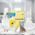 Limoncello Making Kit with infusion jar, bottles, funnel, and natural flavor for crafting homemade limoncello effortlessly.