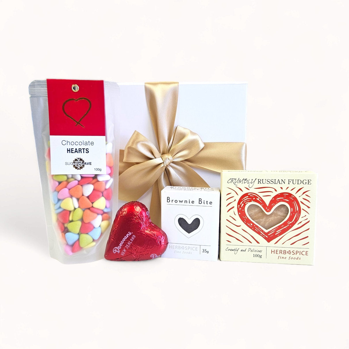 Love Bite - Gift Box featuring chocolates, fudge, and a ribboned magnetic closure, perfect for expressing affection on any occasion.