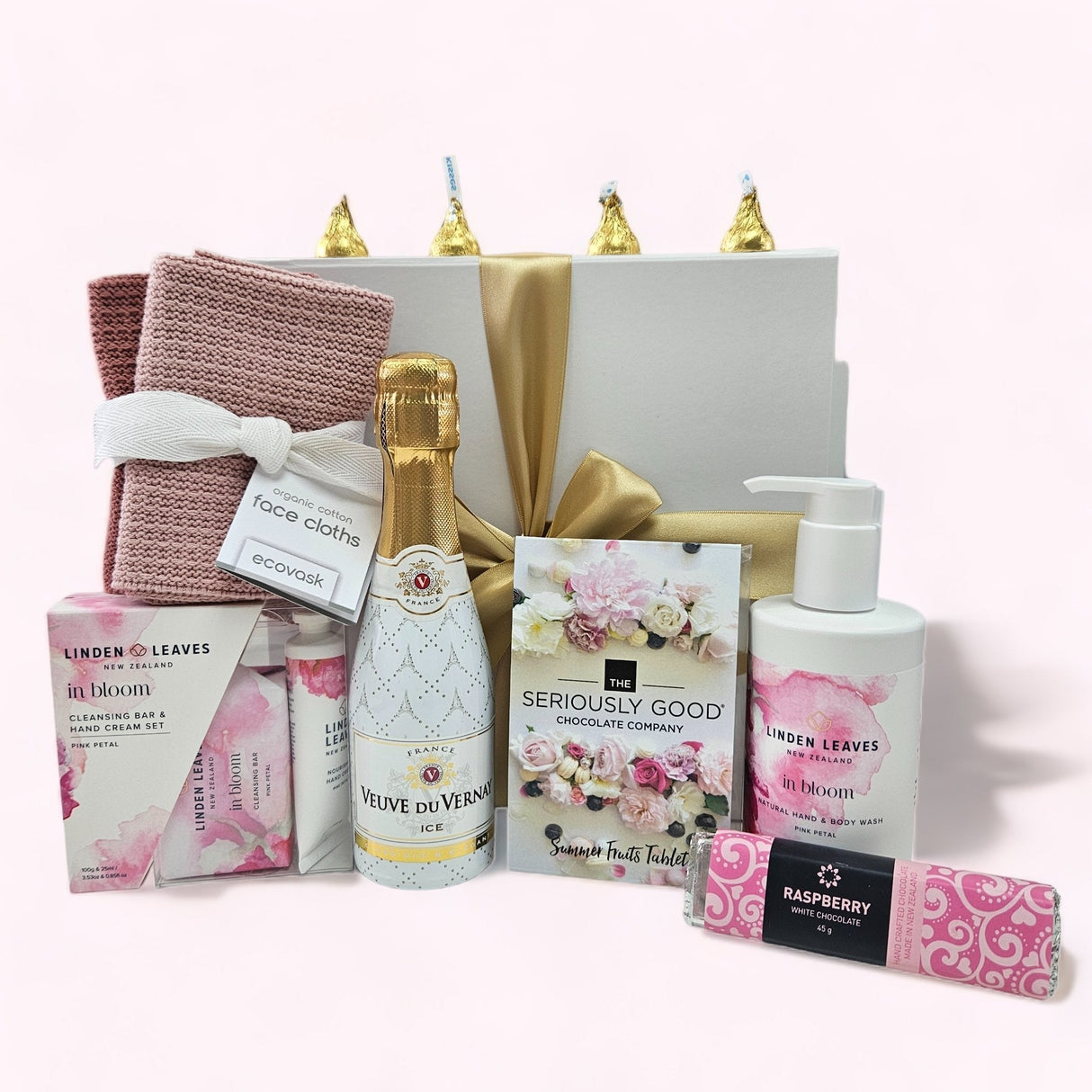 Luxurious pink gift box filled with pampering essentials, treats, and a stylish presentation for any occasion.