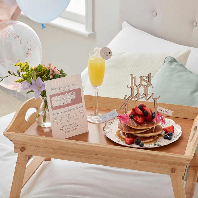 Deluxe Breakfast in Bed Kit featuring customizable menu, elegant toppers, and festive balloons for a memorable morning.
