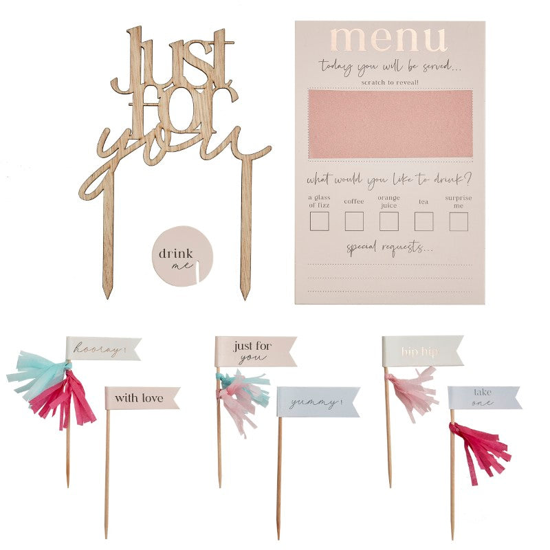 Deluxe Breakfast in Bed Kit with customizable menu, elegant drink toppers, balloons, and decorative cupcake add-ons.