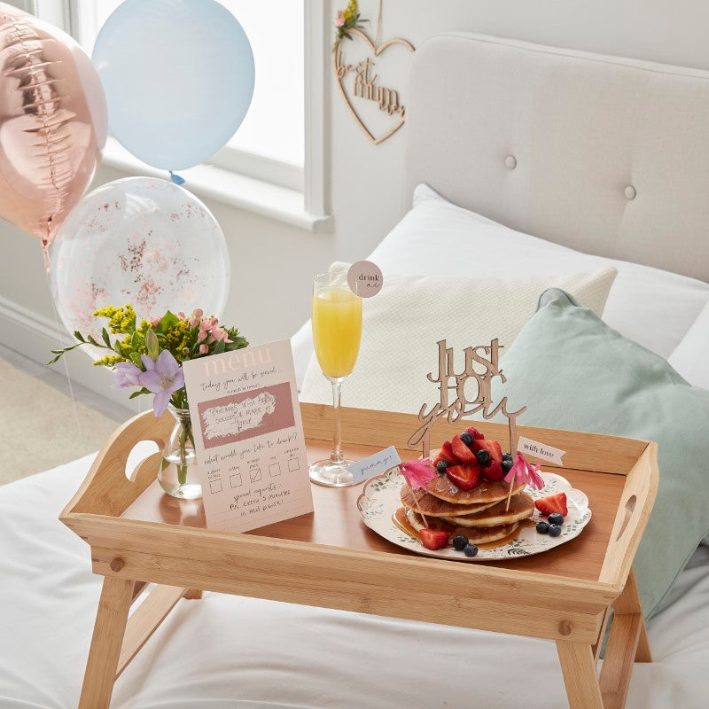 Deluxe Breakfast in Bed Kit with customizable menu, elegant drink topper, and festive decorations for special occasions.