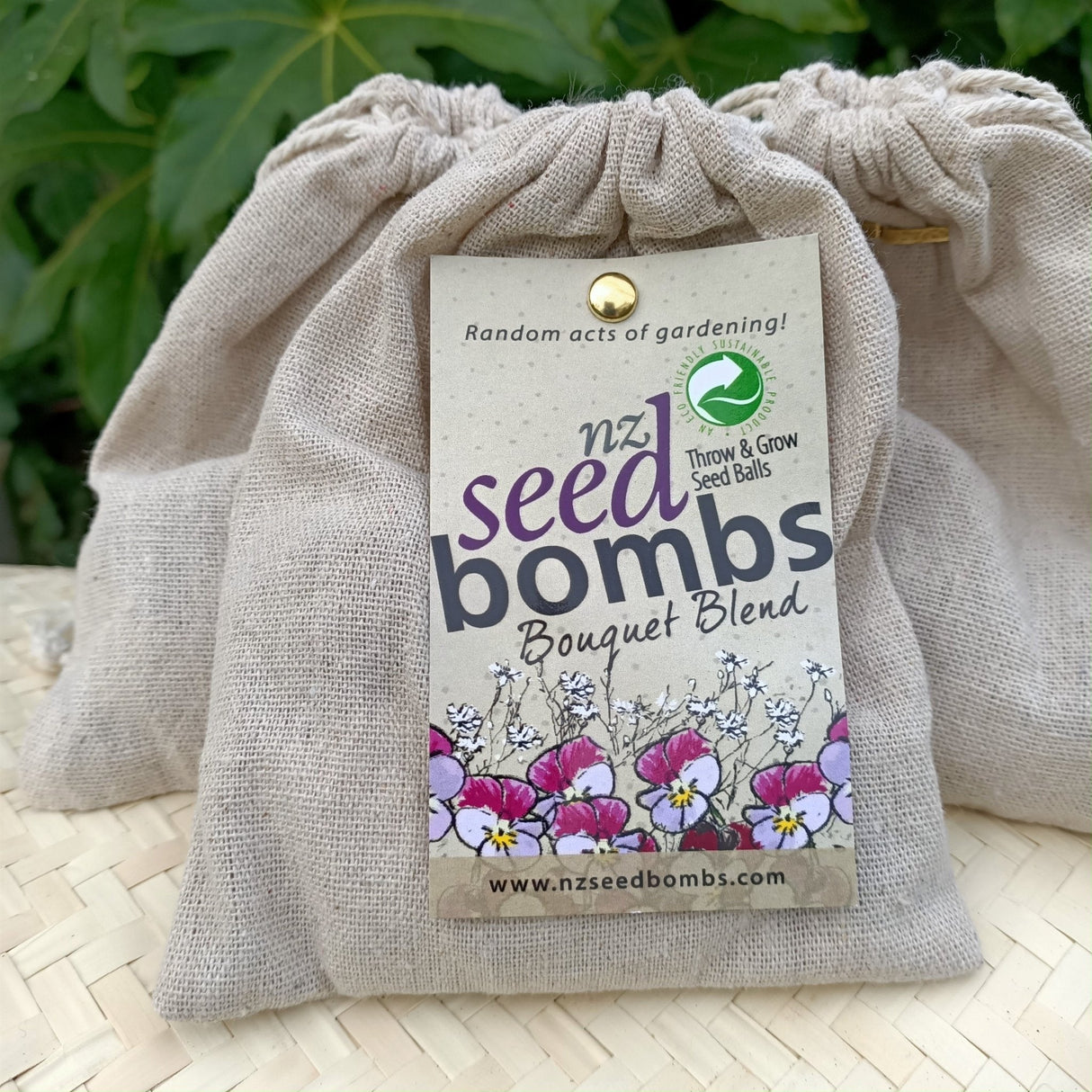Colorful NZ Seed Bombs in a muslin bag, designed for easy "throw and grow" bouquet gardening. Edible violas included.