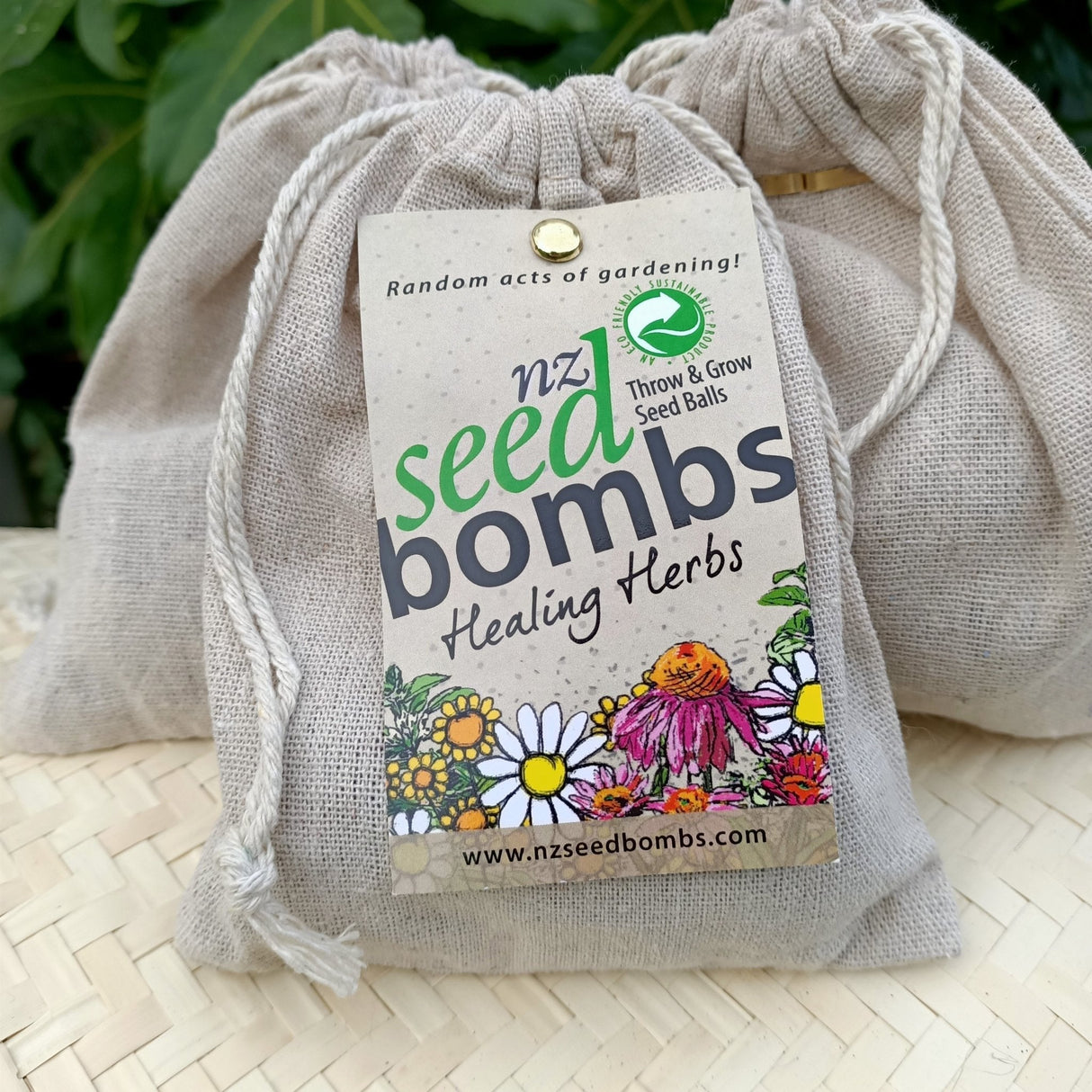 NZ Seed Bombs in a muslin bag, featuring healing herb seeds for easy throw-and-grow gardening.