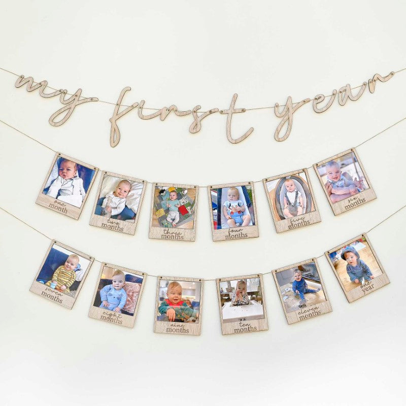 Wooden Baby Photo Bunting featuring 12 photo frames on twine, perfect for celebrating milestones and decorating nurseries.