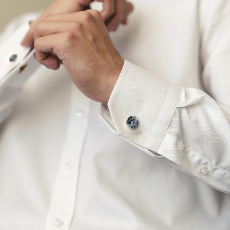 Handcrafted Paua shell cufflinks with unique Koru design, symbolizing growth; perfect gift in a stunning box.
