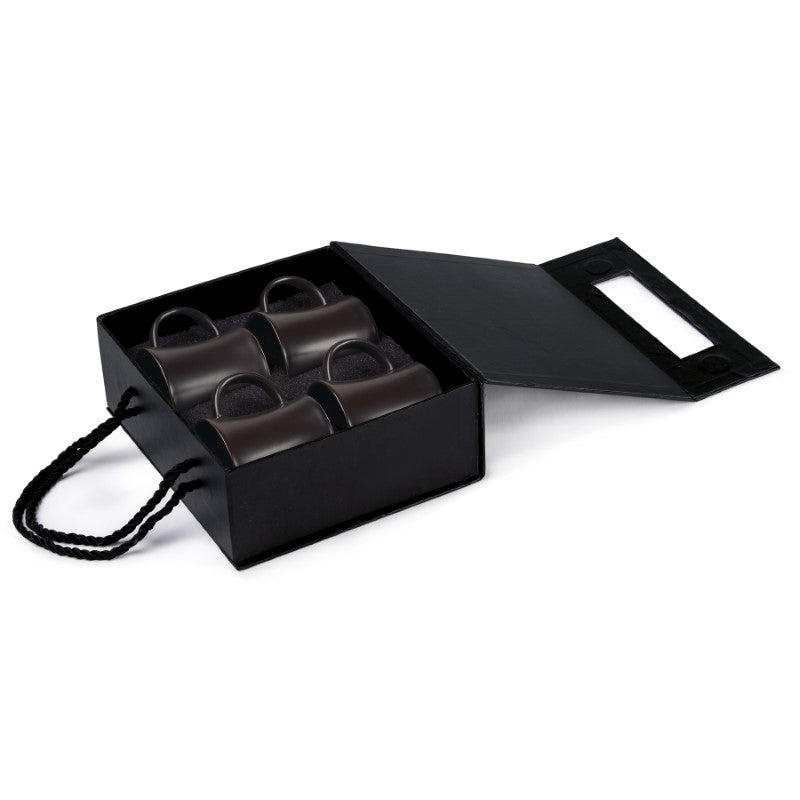 Elegant Quartet Espresso Set with four matte black ceramic cups, perfect for enhancing your coffee experience in style.