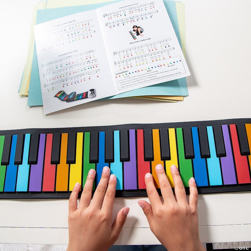 Vibrant Rainbow Rock and Roll It Piano with 49 keys, portable design, and built-in speaker for music on the go.