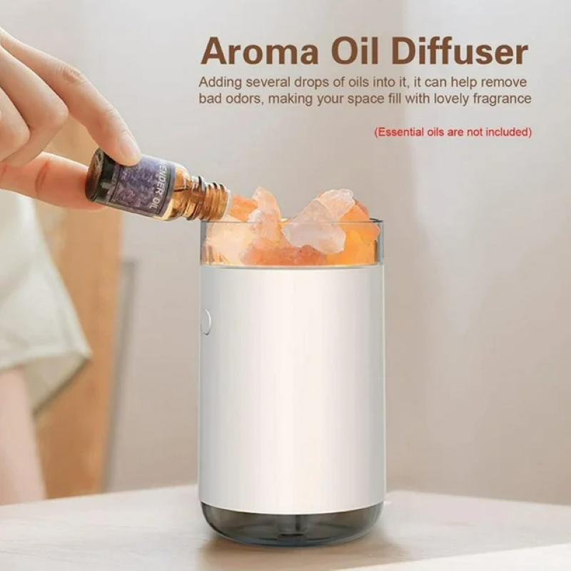 Aromatherapy diffuser with Himalayan salt crystals, featuring LED lights, humidification, and essential oil diffusion for ambiance.