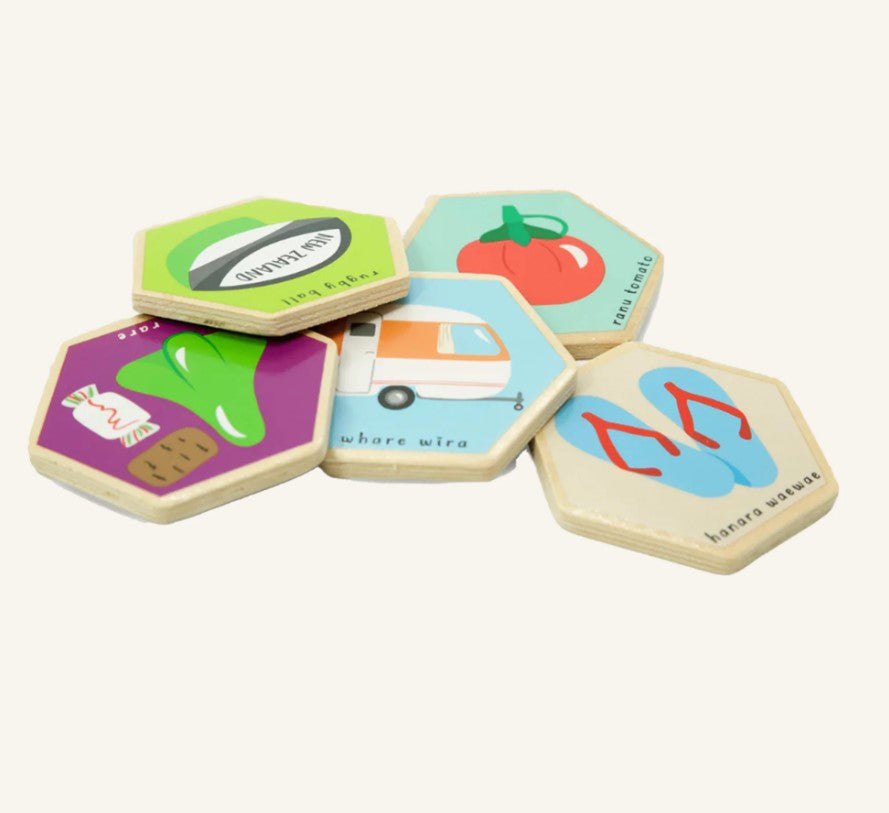 Colorful Kiwiana Memory Game with 28 tiles, blending fun and Maori culture for kids aged 3 and up in a sturdy cylinder.