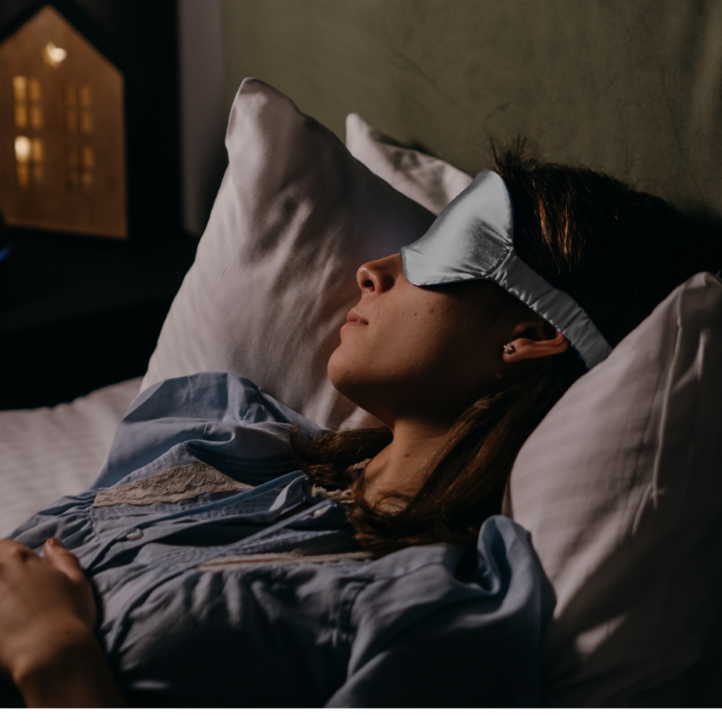 Luxurious pure silk sleep mask with padded design, elastic fit, blocks light for restful sleep and comfort.