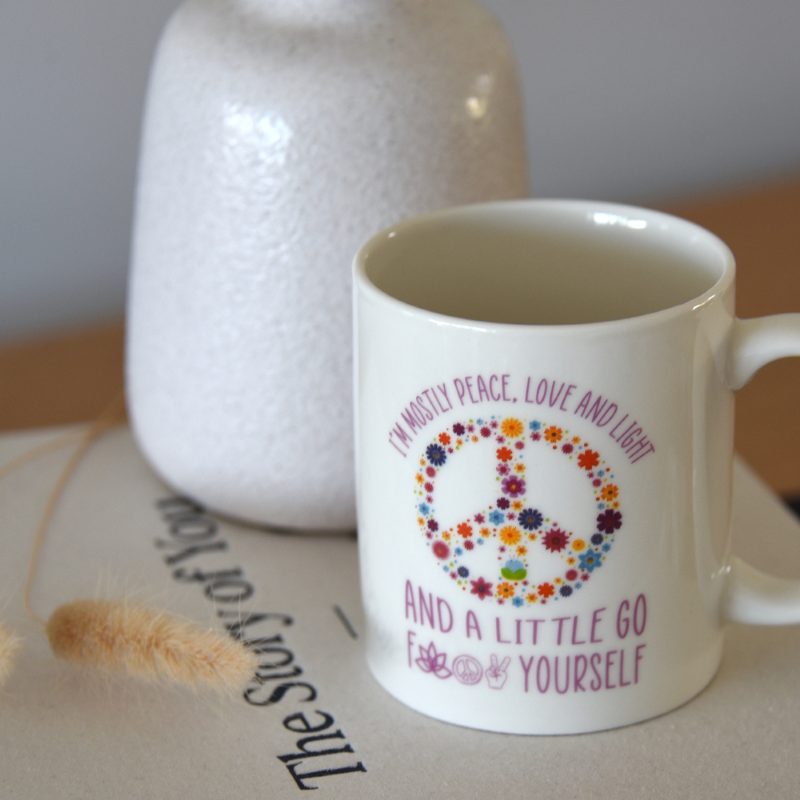 Funny Mostly Peace Mug showcasing quotes and sass, perfect for coffee lovers needing morning tranquility.