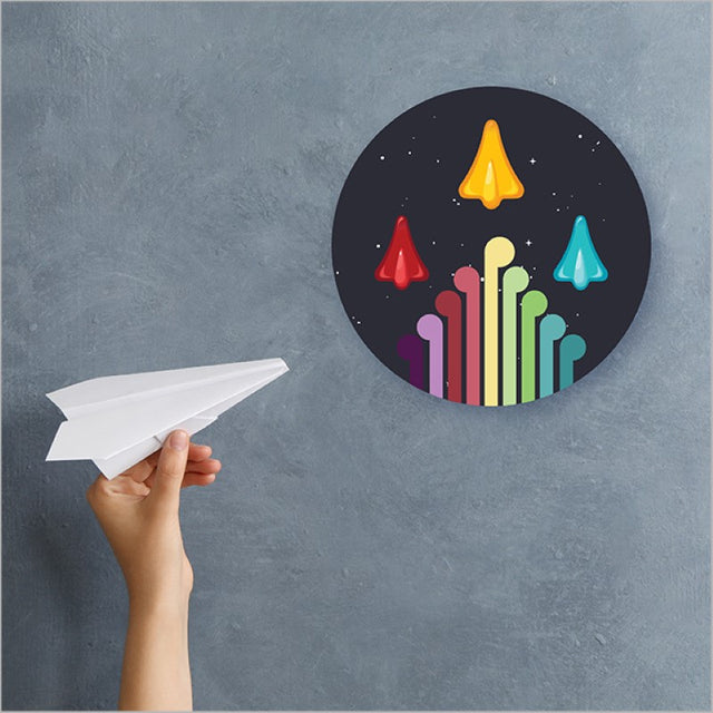 Canvas circle artwork featuring embossed jet planes and Koru design, inspired by Kiwi lollies for vibrant decor.