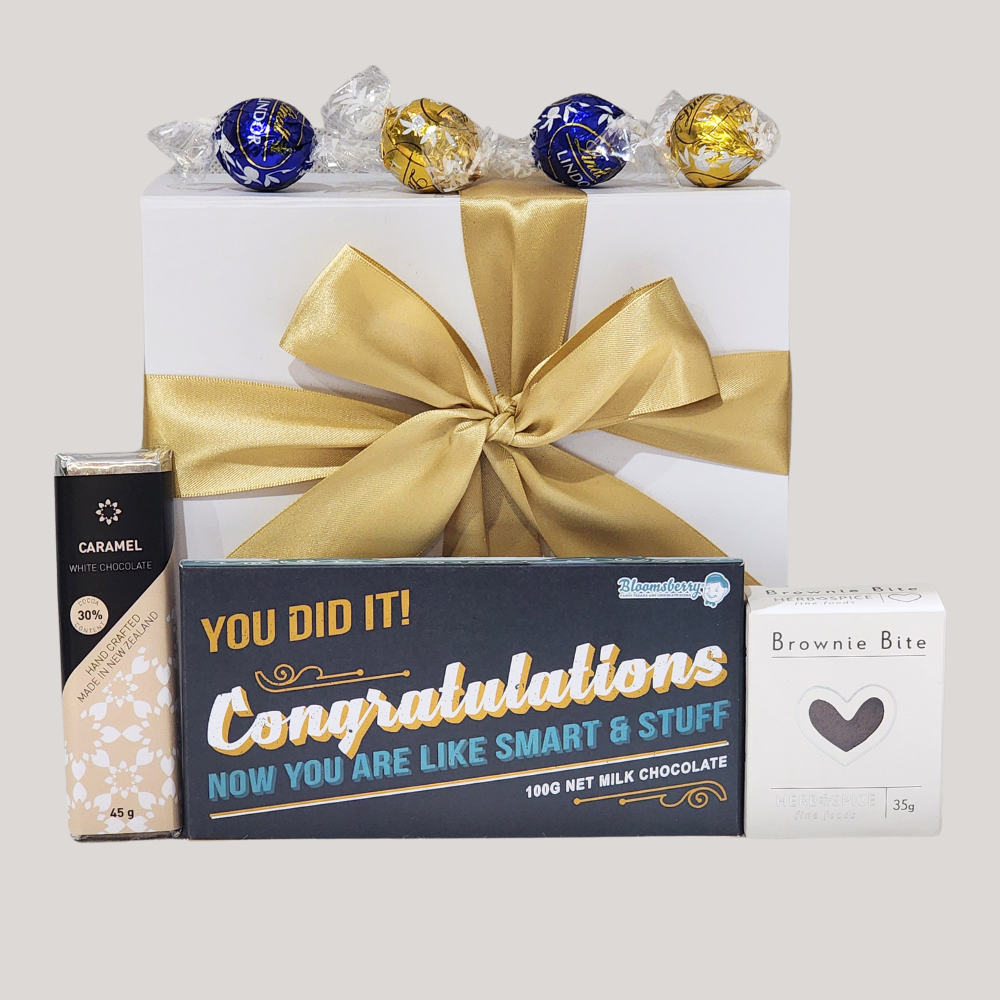 Luxurious 'Congratulations Smarty' gift box featuring chocolates and treats to celebrate achievements and milestones.