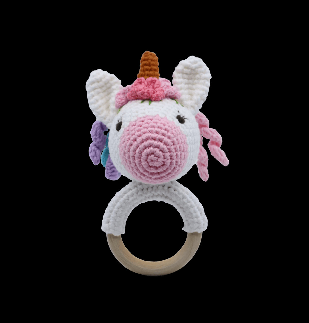 Handmade unicorn rattle made of soft cotton, perfect for babies; includes a drawstring bag for easy carrying.