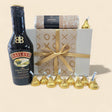 Gift box featuring Baileys Irish Cream, a white chocolate bar, and Hershey's Kisses, perfect for heartfelt gifting.