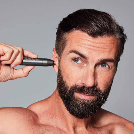 Nose & Ear Trimmer featuring pain-free Diamond Protect Technology, washable design, and compact for on-the-go grooming.