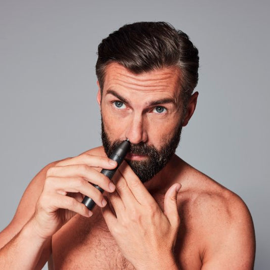 Compact and washable Nose & Ear Trimmer with pain-free Diamond Protect Technology and three-level blade system for precise grooming.