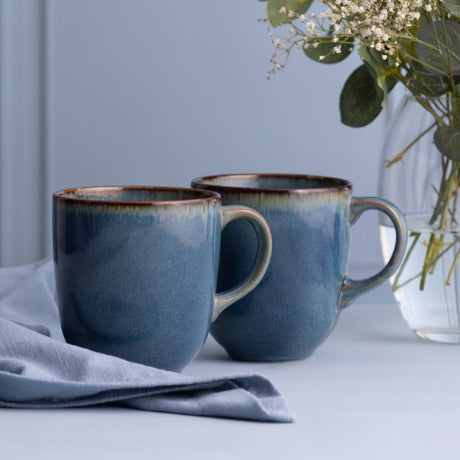 Mason Cash set of 4 unique reactive blue stoneware mugs, 400ml capacity, durable and dishwasher safe.