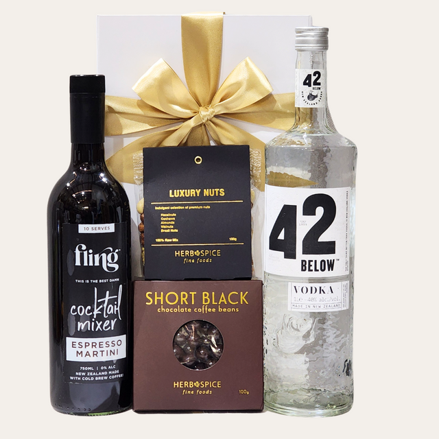 Elegant gift box set featuring 42 Below vodka, Espresso Martini mixer, gourmet nuts, and chocolate-coated coffee beans.