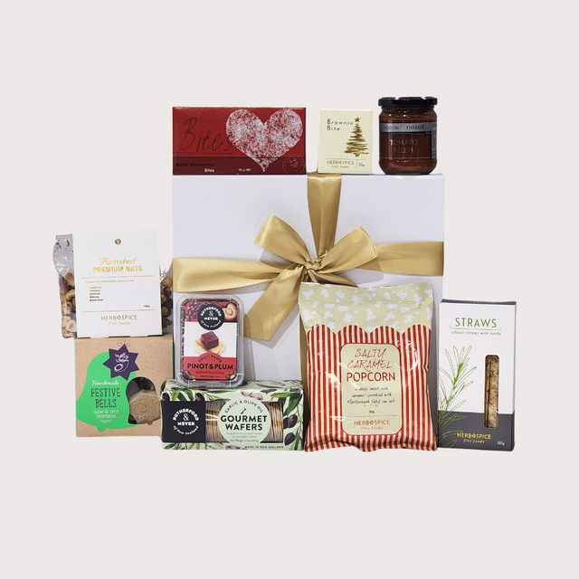 Luxurious Christmas Delights Gift Box featuring gourmet snacks and sweets for festive celebrations.