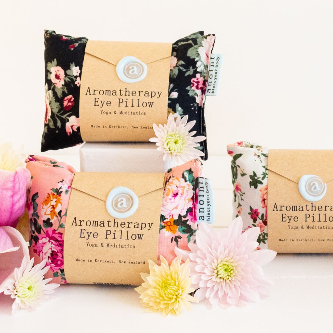 Luxurious Anoint Aromatherapy Eye Pillow featuring floral fabric, botanical filling, and relaxing essential oils for deep tranquility.