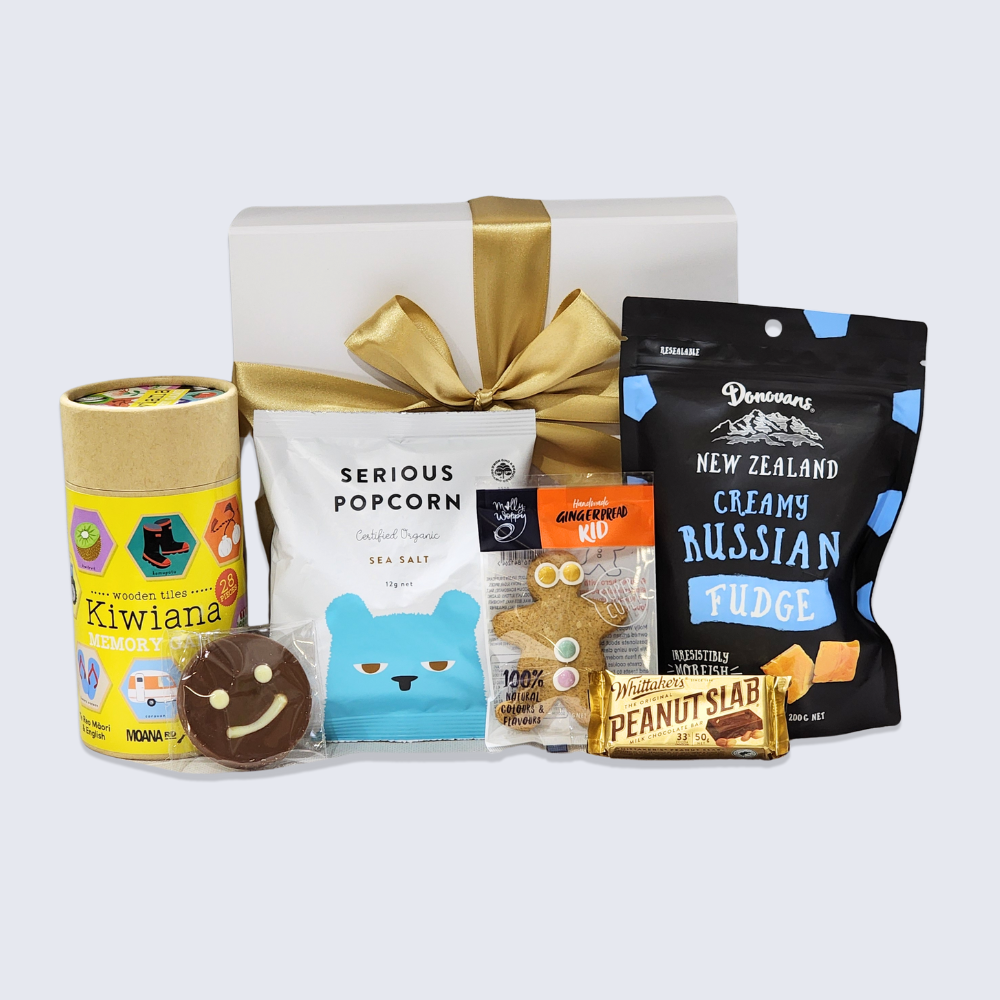 Kids Fun & Yum Gift Box featuring games and gourmet snacks, elegantly packaged for delightful gifting experiences.