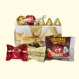 Mini Treat & Sweets Gift Box with assorted chocolates and fudge, packaged elegantly to spread joy and warmth.