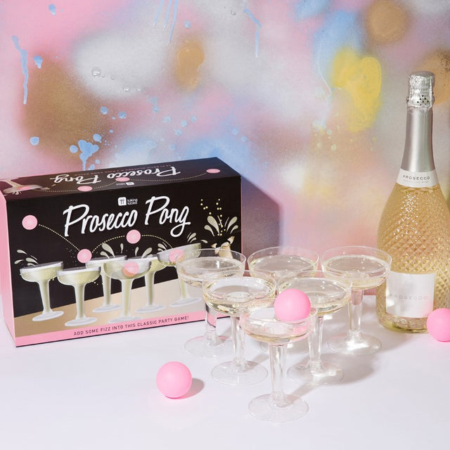 Prosecco Pong game set with 12 glasses and 3 pink balls, ideal for stylish parties and celebrations.