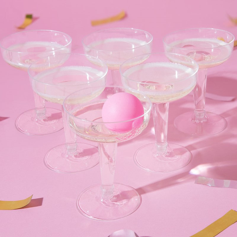 Prosecco Pong game set featuring 12 glasses and 3 ping pong balls, perfect for fun and elegant celebrations.